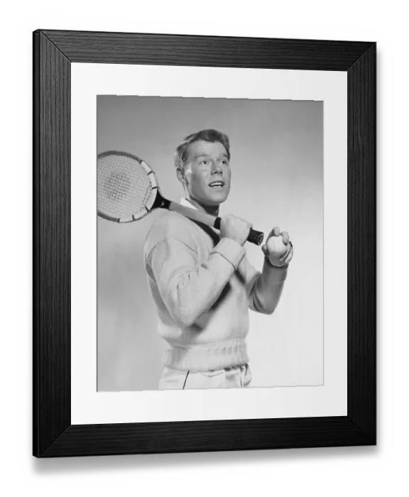 Framed Print : Man holding tennis racket over his shoulder Framed Print : Man holding tennis racket over his shoulder