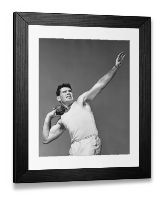 Framed Print : Man throwing shotput Framed Print : Man throwing shotput
