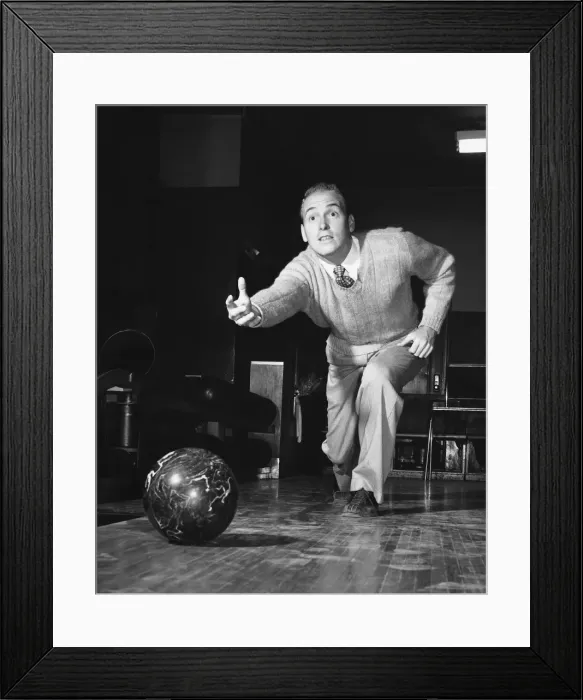 Framed Print : Man throwing bowling ball down lane Framed Print : Man throwing bowling ball down lane