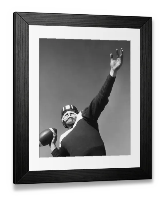 Framed Print : Man preparing to throw football Framed Print : Man preparing to throw football