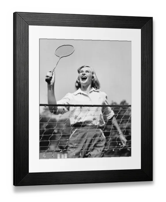Framed Print : Woman playing badminton Framed Print : Woman playing badminton