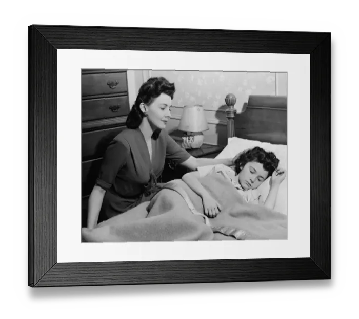 Framed Print : Mother looking at sleeping daughter (8-9), (B&W) Framed Print : Mother looking at sleeping daughter (8-9), (B&W)