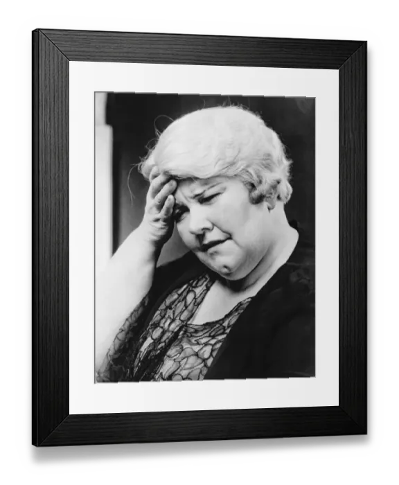 Framed Print : Mature woman suffering headache, (B&W), close-up Framed Print : Mature woman suffering headache, (B&W), close-up