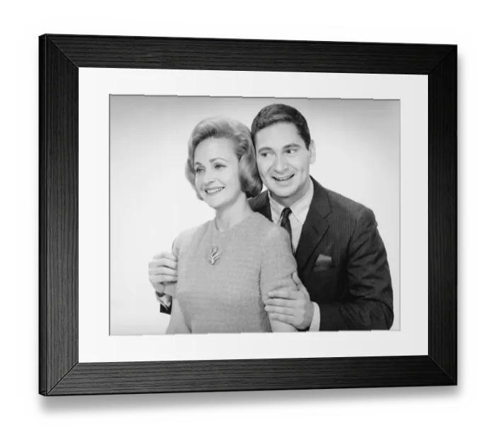 Framed Print : Mature couple posing in studio, (B&W) Framed Print : Mature couple posing in studio, (B&W)