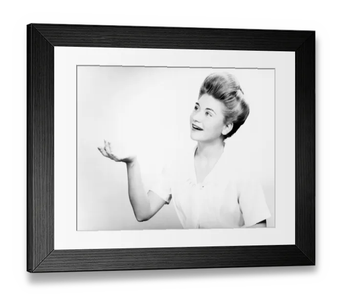 Framed Print : Woman gesturing in studio, (B&W), portrait Framed Print : Woman gesturing in studio, (B&W), portrait