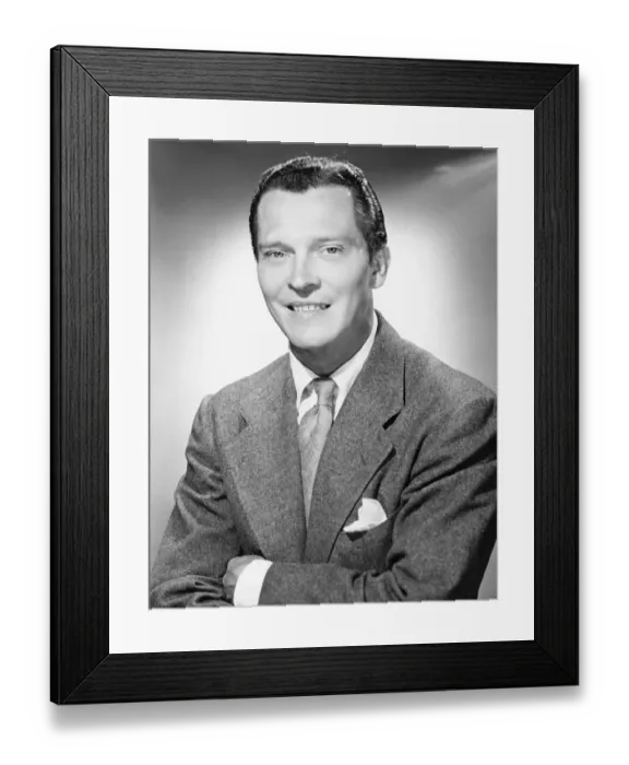 Framed Print : Man in full suit posing in studio, (B&W), close-up, portrait Framed Print : Man in full suit posing in studio, (B&W), close-up, portrait