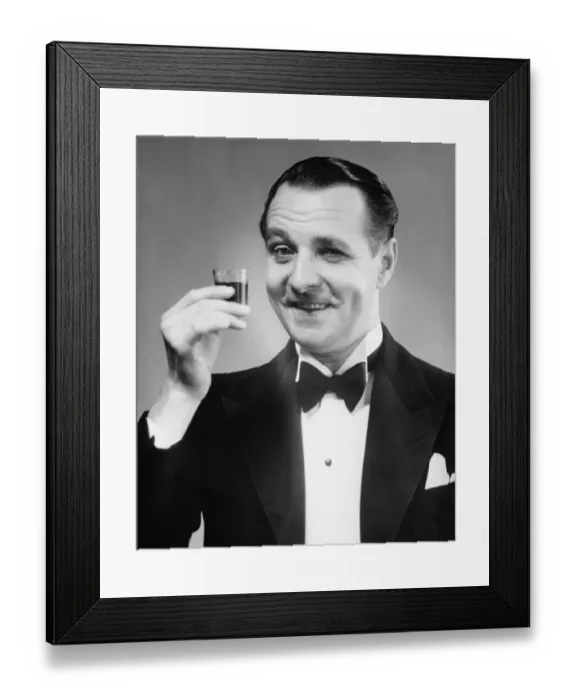 Framed Print : Elegant man posing in studio, (B&W), close-up, portrait Framed Print : Elegant man posing in studio, (B&W), close-up, portrait