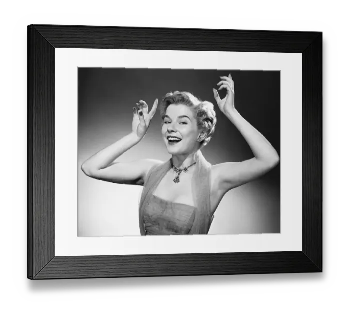 Framed Print : Woman with arms raised in air Framed Print : Woman with arms raised in air