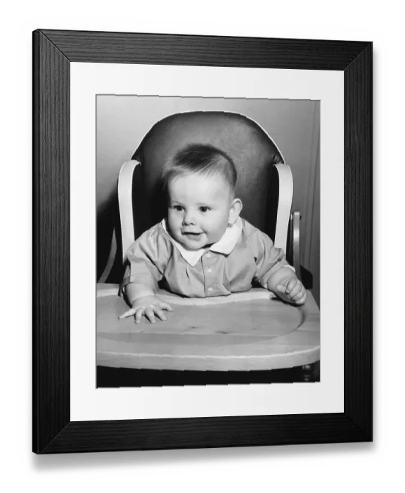 Framed Print : Baby sitting in high chair Framed Print : Baby sitting in high chair
