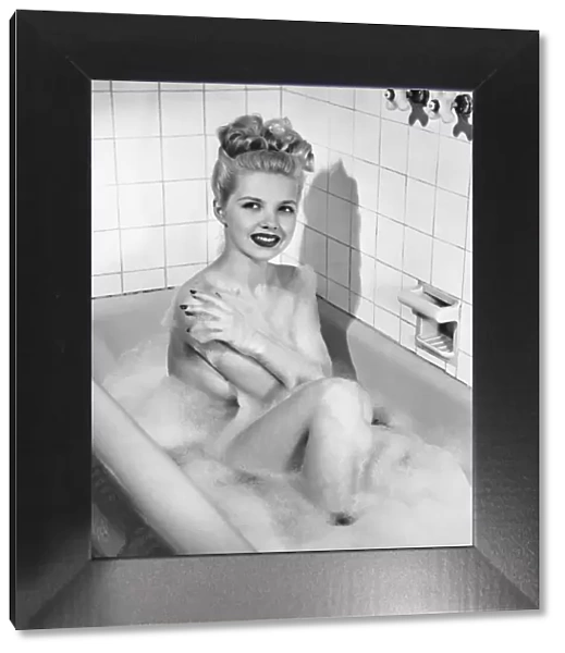 Woman having bubble bath