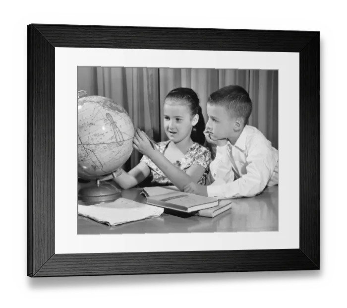 Framed Print : Boy and girl looking at globe Framed Print : Boy and girl looking at globe