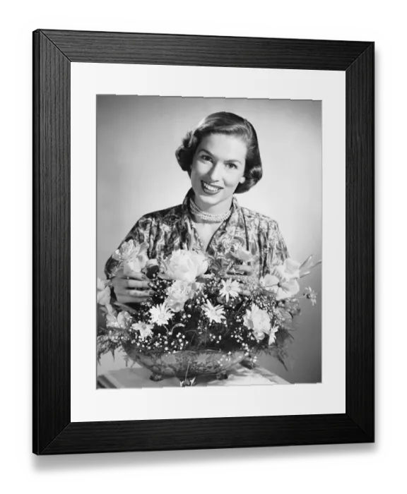 Framed Print : Woman arranging flowers Framed Print : Woman arranging flowers