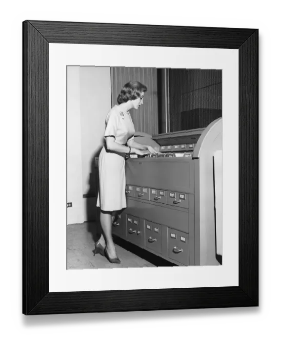 Framed Print : Woman filing Framed Print : Woman filing