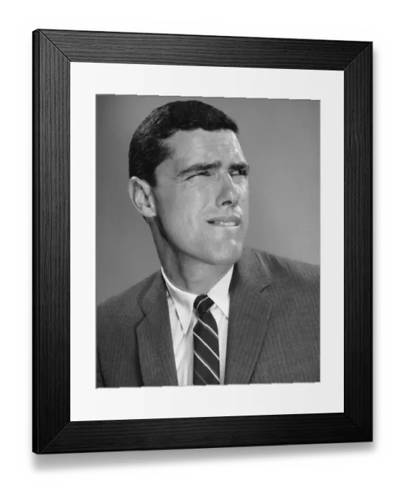 Framed Print : Man biting lip and squinting Framed Print : Man biting lip and squinting