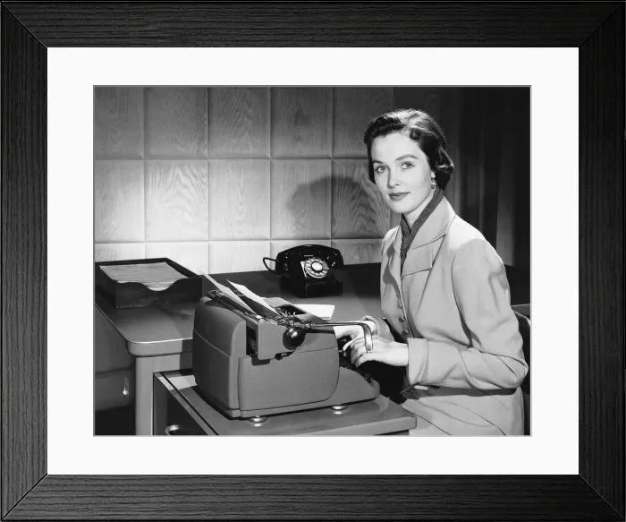 Framed Print : Woman typing Framed Print : Woman typing