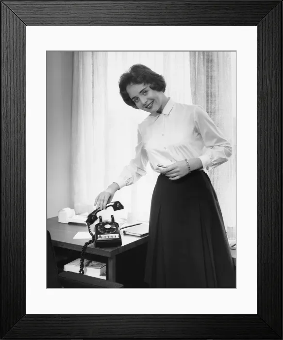 Framed Print : Woman holding phone Framed Print : Woman holding phone