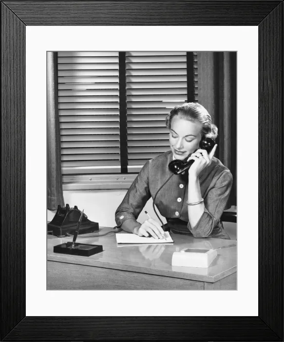 Framed Print : Woman answering phone Framed Print : Woman answering phone