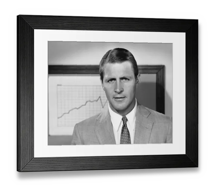 Framed Print : Man in front of graph Framed Print : Man in front of graph