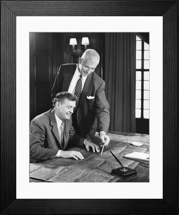 Framed Print : Two men looking at blueprints Framed Print : Two men looking at blueprints