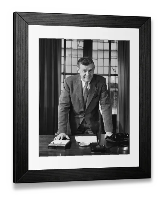 Framed Print : Man leaning on desk Framed Print : Man leaning on desk