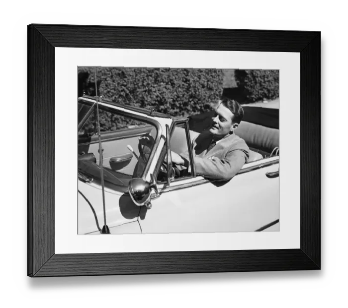 Framed Print : Man driving convertible