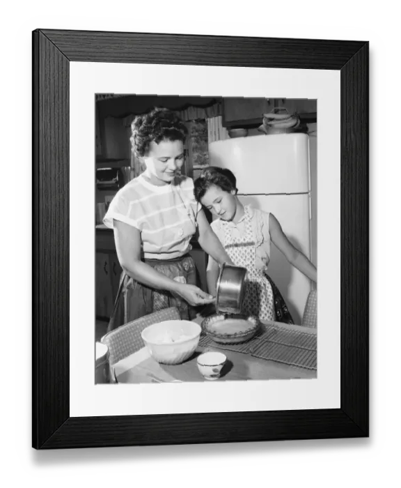 Framed Print : Mother and daughter making pie Framed Print : Mother and daughter making pie