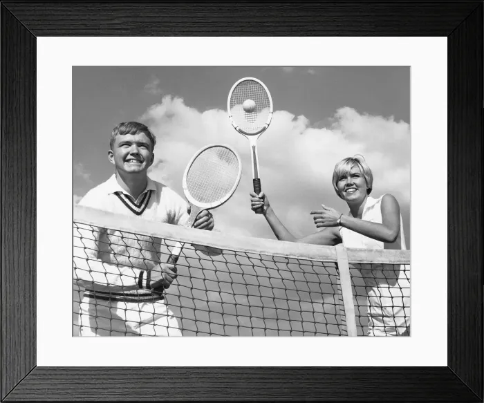 Framed Print : Man and woman playing tennis Framed Print : Man and woman playing tennis