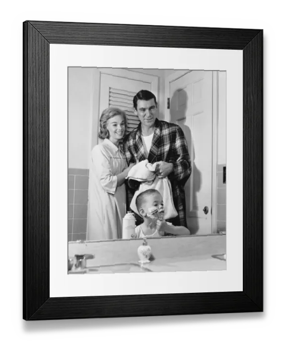 Framed Print : Parents watching as son pretends to shave Framed Print : Parents watching as son pretends to shave