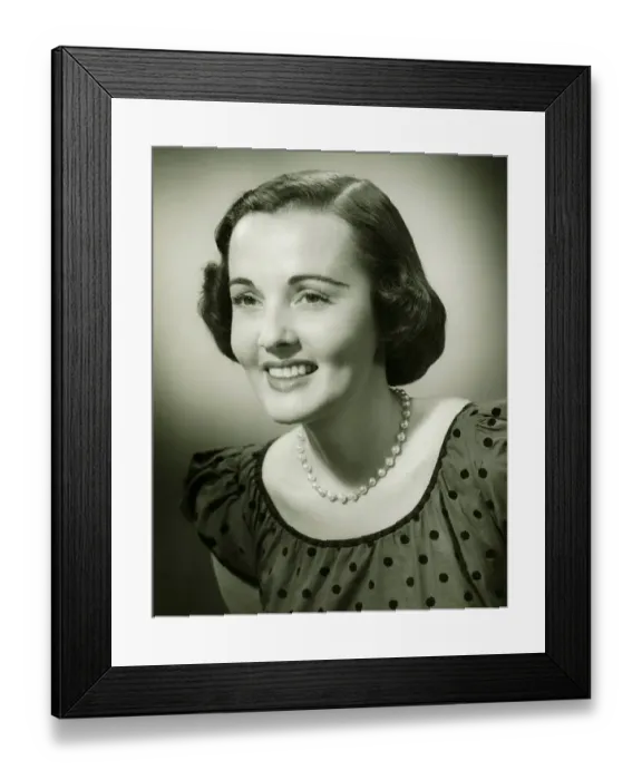 Framed Print : Woman in spotted dress posing in studio, (B&W), (Close-up), (Portrait) Framed Print : Woman in spotted dress posing in studio, (B&W), (Close-up), (Portrait)
