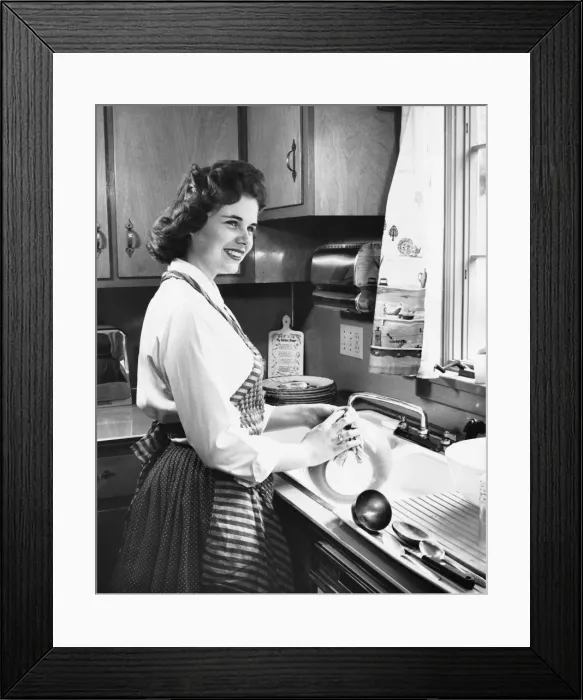 Framed Print : Woman washing dishes in kitchen Framed Print : Woman washing dishes in kitchen
