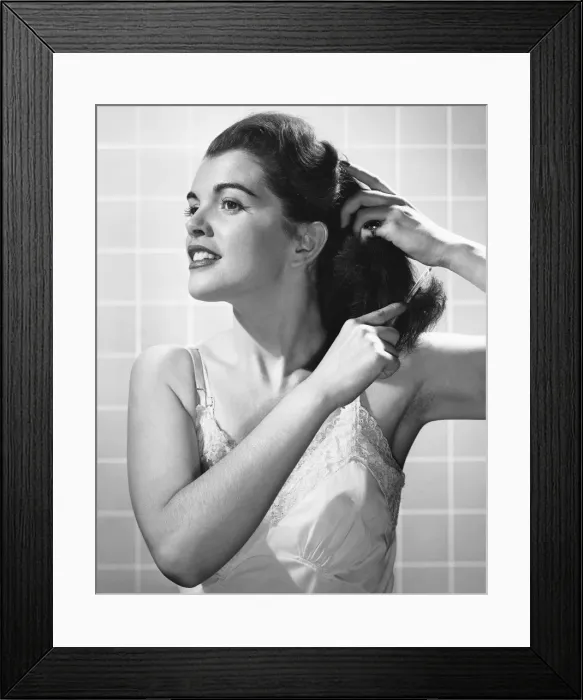 Framed Print : Woman combing hair Framed Print : Woman combing hair