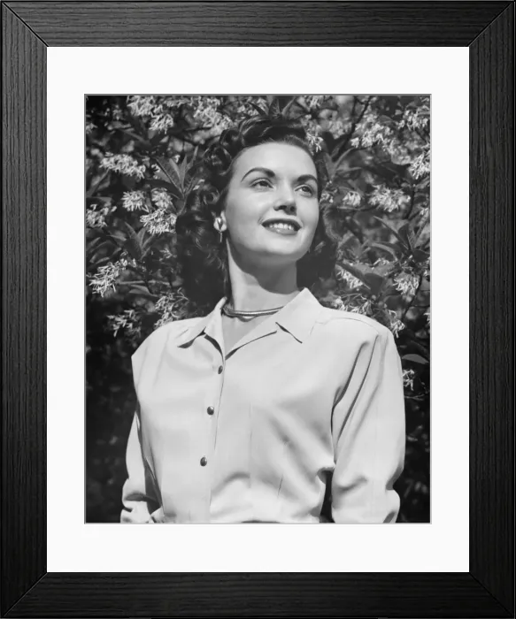 Framed Print : Young woman posing by blooming tree, (B&W), (Close-up), (Portrait), (Low angle view) Framed Print : Young woman posing by blooming tree, (B&W), (Close-up), (Portrait), (Low angle view)