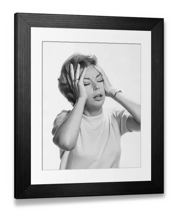 Framed Print : Woman holding head Framed Print : Woman holding head