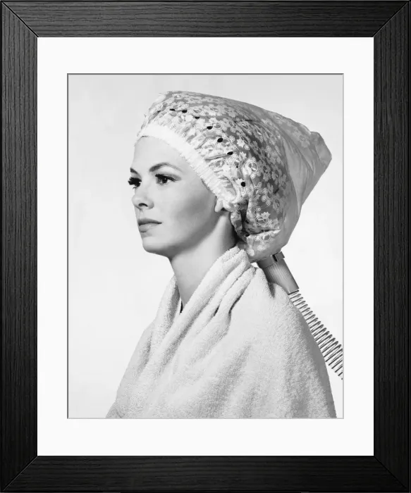 Framed Print : Woman with hairdryer on head
