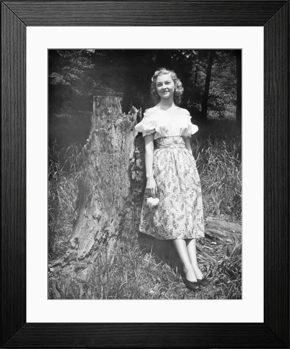 Framed Print : Woman leaning against tree trunk in forest, (B&W), (Portrait) Framed Print : Woman leaning against tree trunk in forest, (B&W), (Portrait)