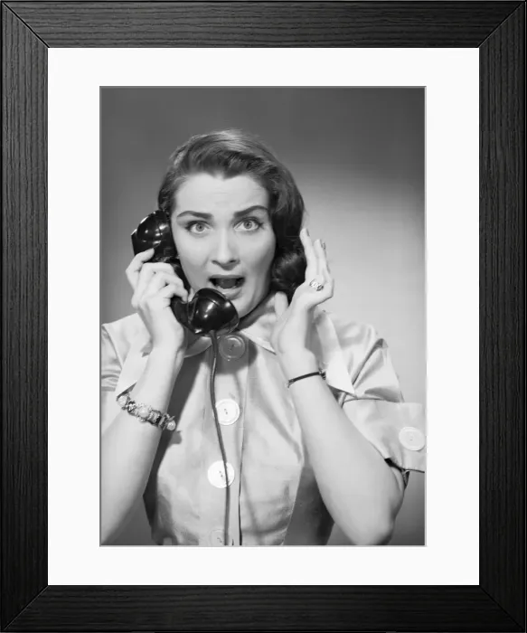 Framed Print : Portrait of woman talking on phone
