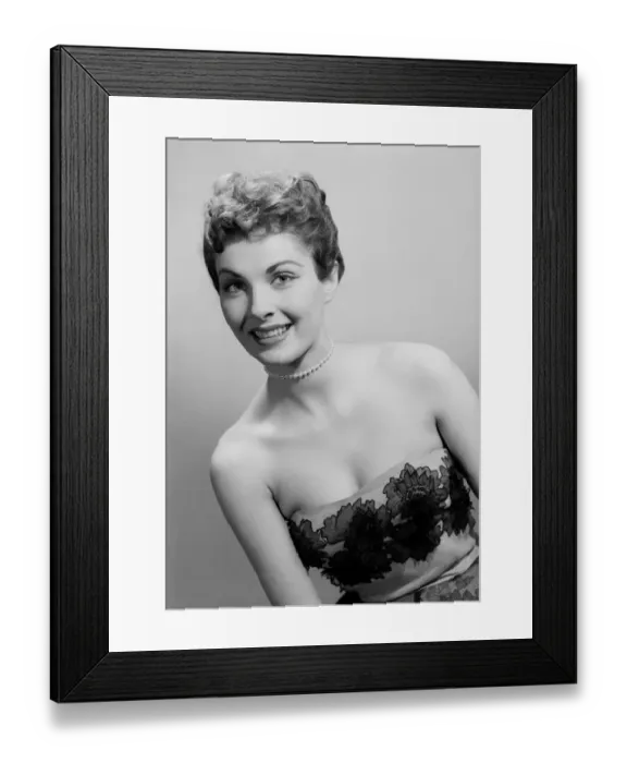 Framed Print : Studio portrait of mid adult woman Framed Print : Studio portrait of mid adult woman