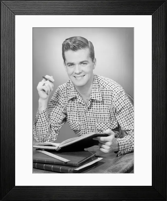 Framed Print : Portrait of man with notebooks Framed Print : Portrait of man with notebooks