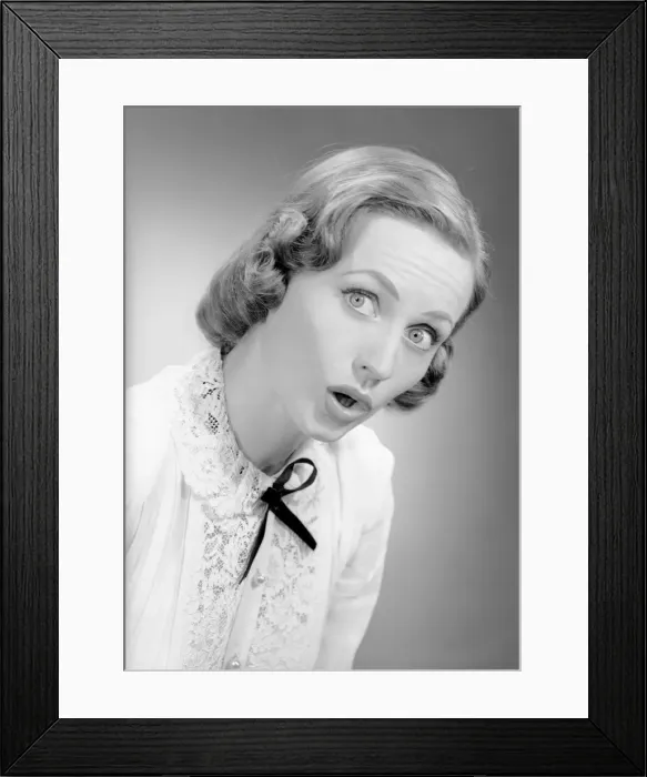 Framed Print : Young woman with facial expression, portrait Framed Print : Young woman with facial expression, portrait