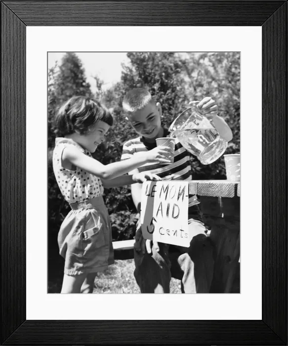 Framed Print : Girl and boy at lemonade stand Framed Print : Girl and boy at lemonade stand