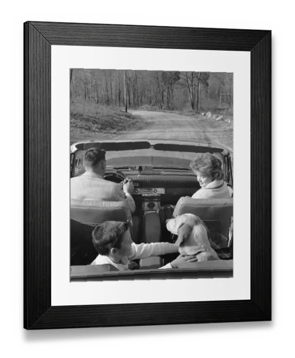 Framed Print : Family driving in convertible along country road Framed Print : Family driving in convertible along country road