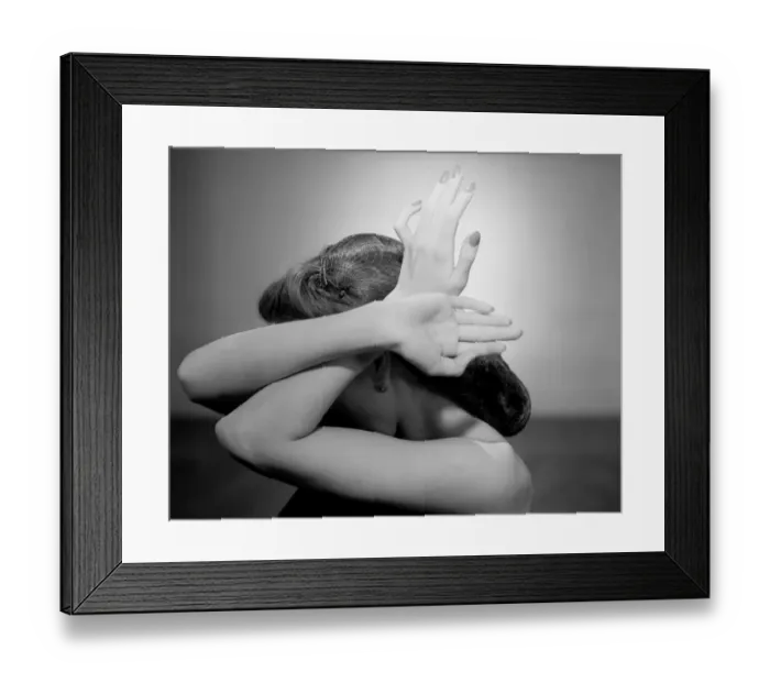 Framed Print : Young woman covering head with arms Framed Print : Young woman covering head with arms
