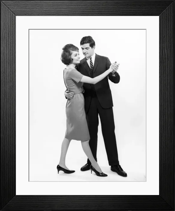 Framed Print : Couple dancing, studio shot Framed Print : Couple dancing, studio shot