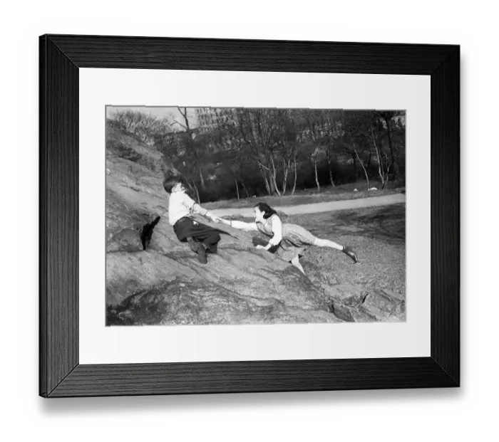 Framed Print : Boy and girl (10-11) playing in park Framed Print : Boy and girl (10-11) playing in park