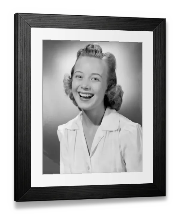 Framed Print : Young woman smiling, portrait Framed Print : Young woman smiling, portrait