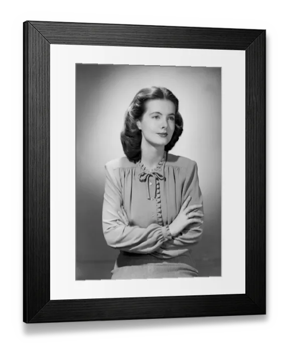 Framed Print : Young woman with arms crossed, portrait Framed Print : Young woman with arms crossed, portrait
