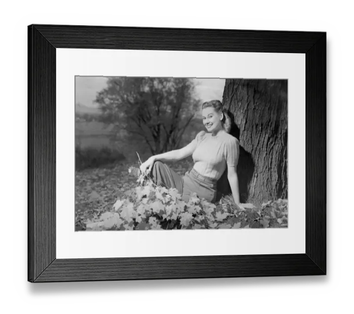 Framed Print : Woman sitting beside tree, portrait Framed Print : Woman sitting beside tree, portrait