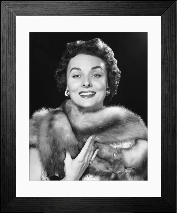 Framed Print : Woman smiling, wearing fur stole