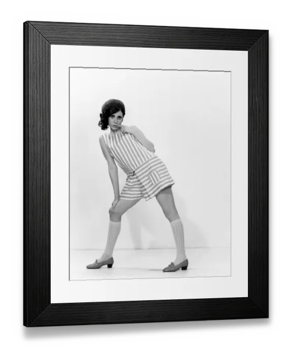 Framed Print : Studio portrait of young woman posing Framed Print : Studio portrait of young woman posing