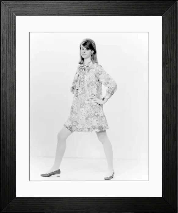 Framed Print : Studio portrait of young woman posing Framed Print : Studio portrait of young woman posing